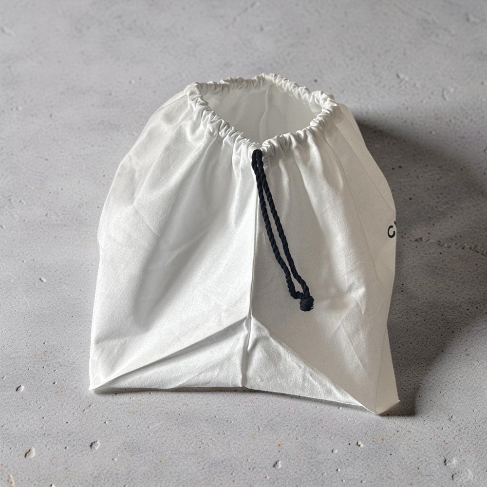 Authentic CHANEL Cotton Drawstring Pouch in White with Cream Tone - Picture 2 of 3